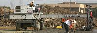 photo of concrete contractor at work